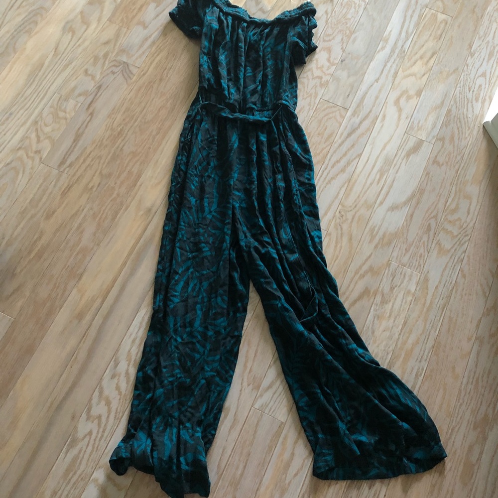 Adorable emerald green off the shoulder jumpsuit